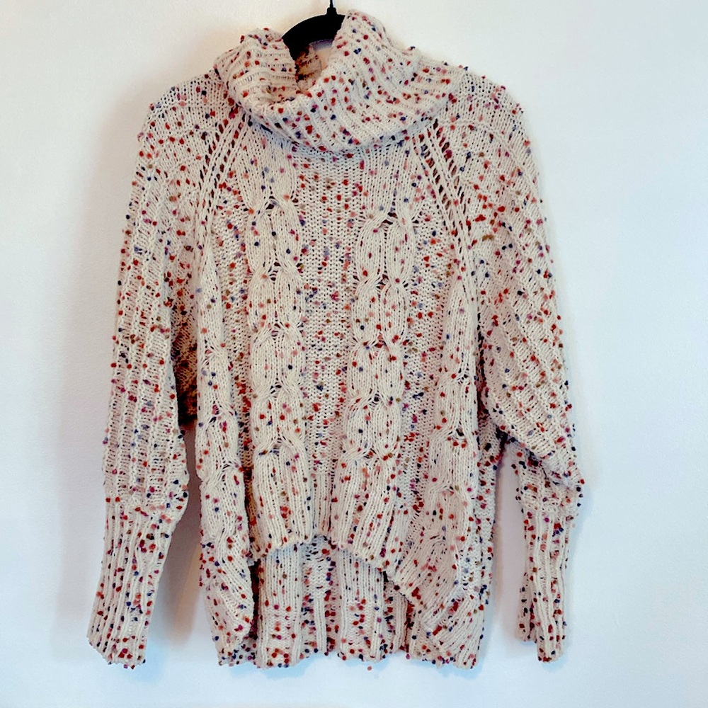 Moon & Madison cream colored turtleneck sweater w/ colorful mini Pom detail. $15